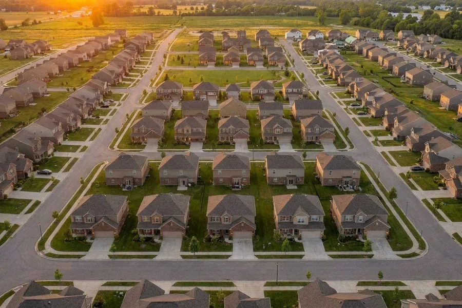Production-home community at sunset